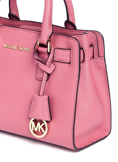 michael kors pink satchel purse.